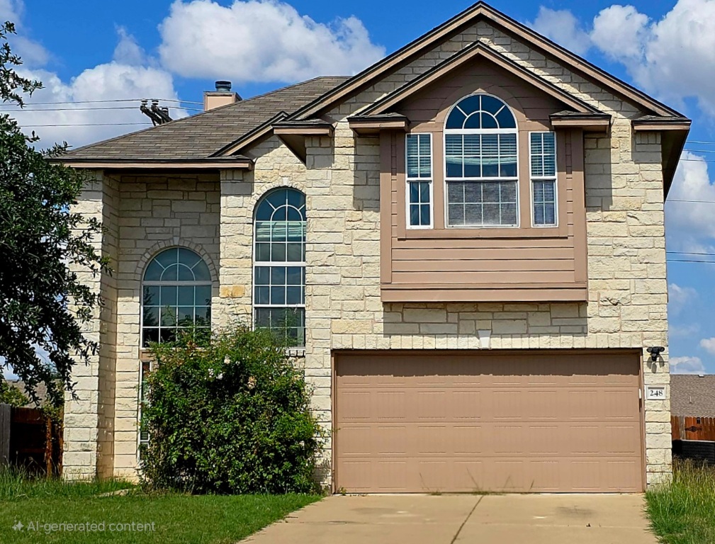 248 Coal Drive Jarrell, TX 76537 - Photo 1 of 1 a front view of a house with garden