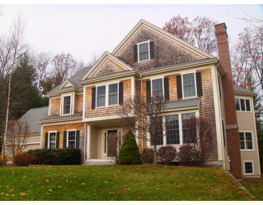 10 Johnson Farm Road Lexington, MA 02420 - Photo 1 of 1 a front view of a house with a yard