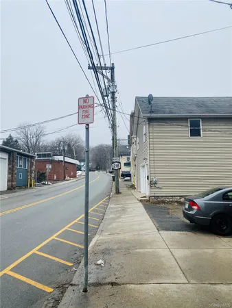a view of a street with cars