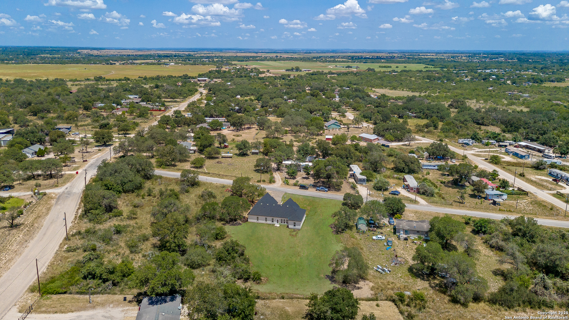 120 County Road 6852 Lytle, TX 78052 - Photo 25 of 36 a view of an outdoor space and a lake view