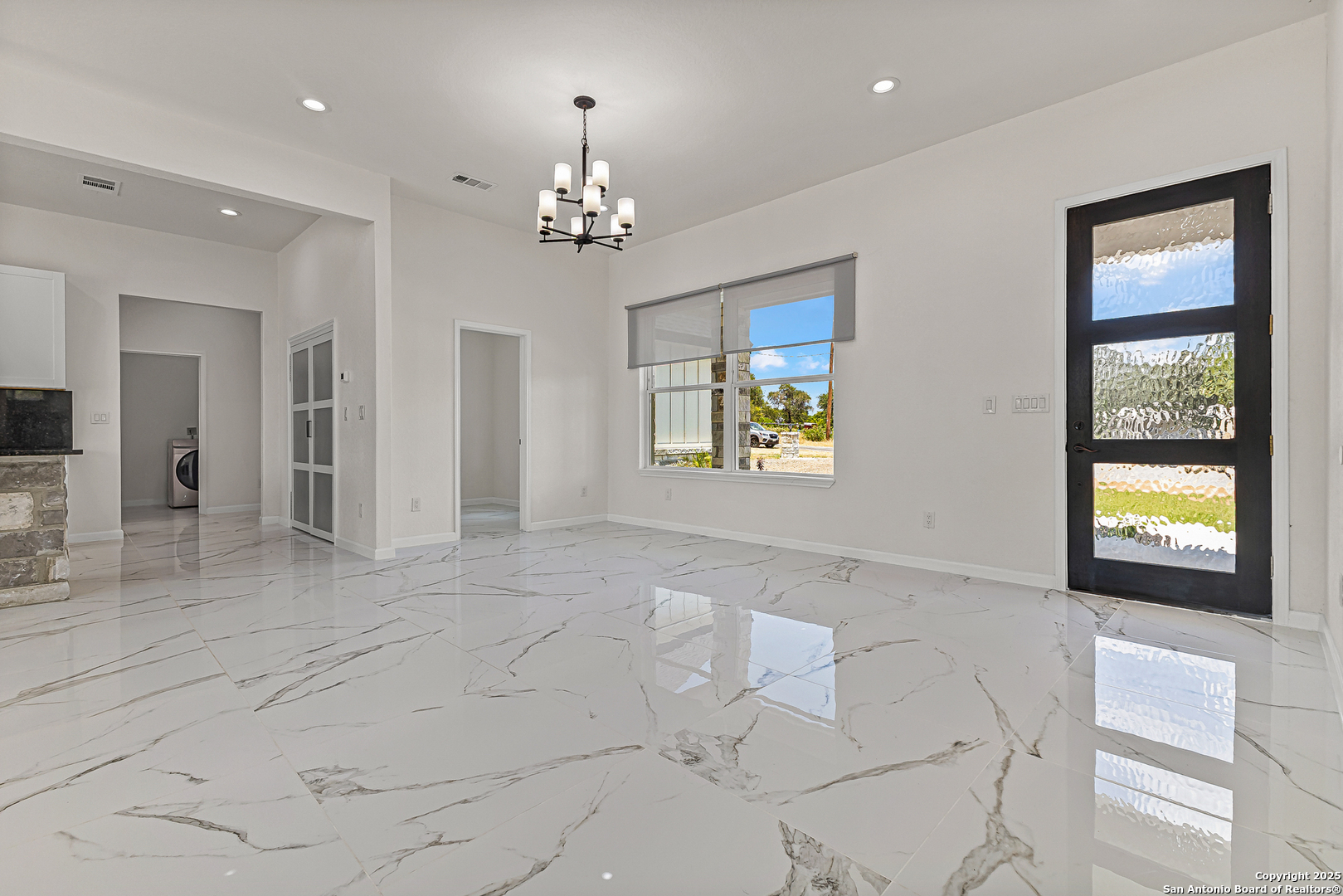 120 County Road 6852 Lytle, TX 78052 - Photo 10 of 36 a view of an empty room and a window