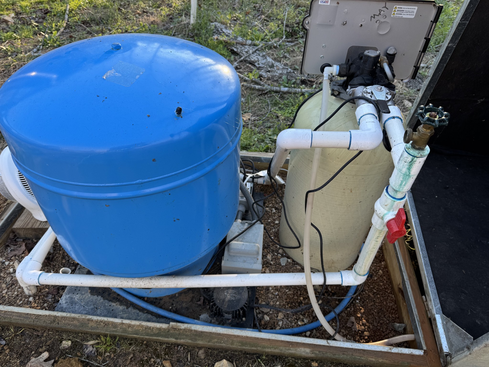 664 Russ Valley Road Lobelville, TN 37097 - Photo 60 of 63 a room with water heater and wooden floor