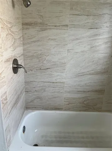 a bathroom with a bathtub