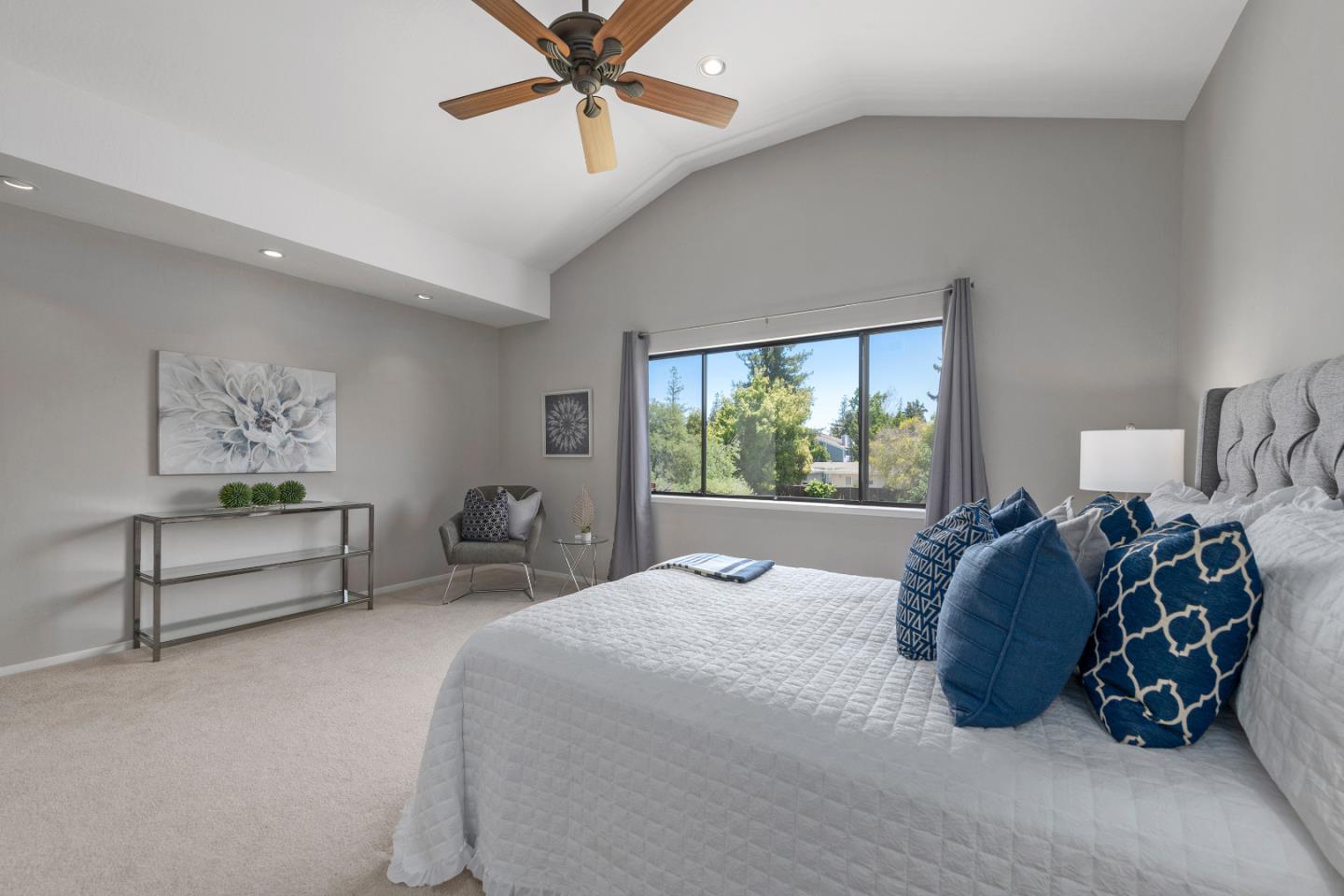 334 West Rincon Avenue Campbell, CA 95008 - Photo 13 of 25 a bed room with a bed and a chandelier