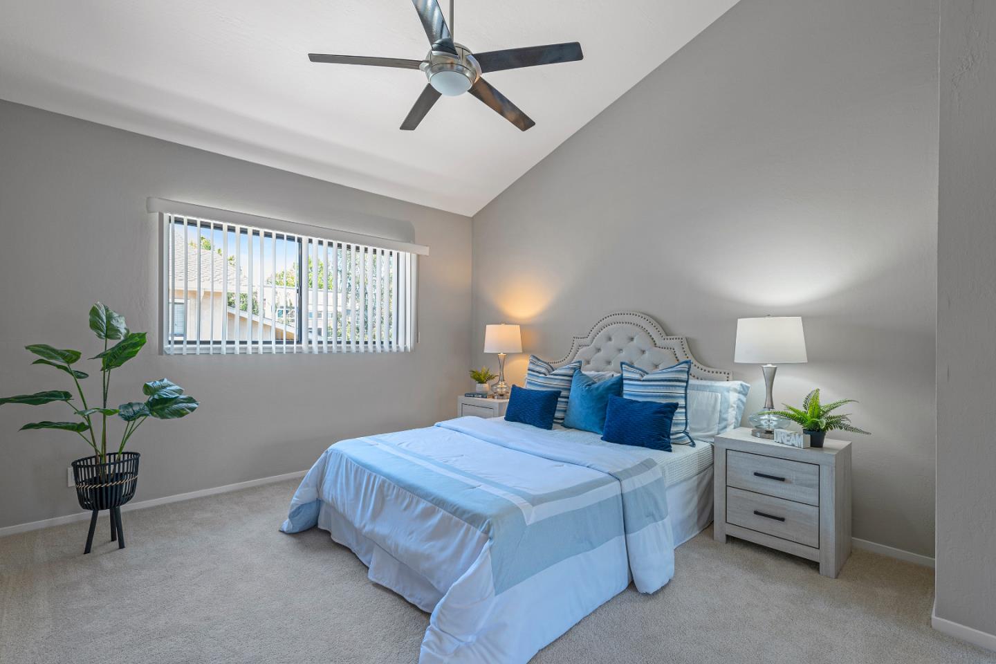 334 West Rincon Avenue Campbell, CA 95008 - Photo 17 of 25 a bedroom with a bed and a potted plant