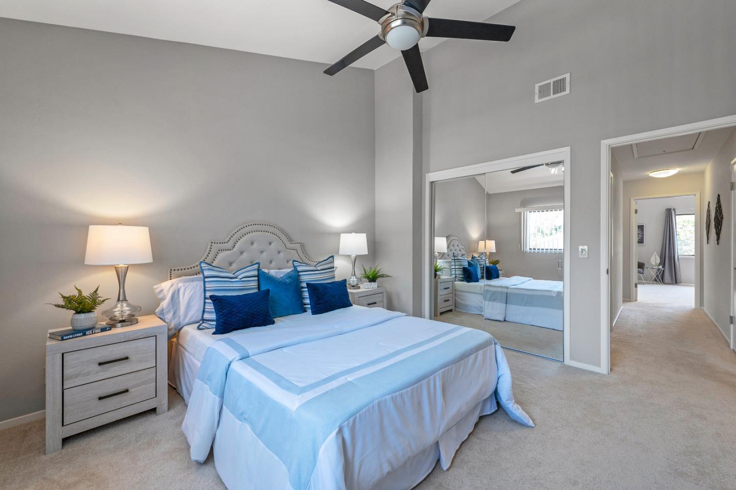 334 West Rincon Avenue Campbell, CA 95008 - Photo 18 of 25 a bedroom with a bed a lamp and a large closet