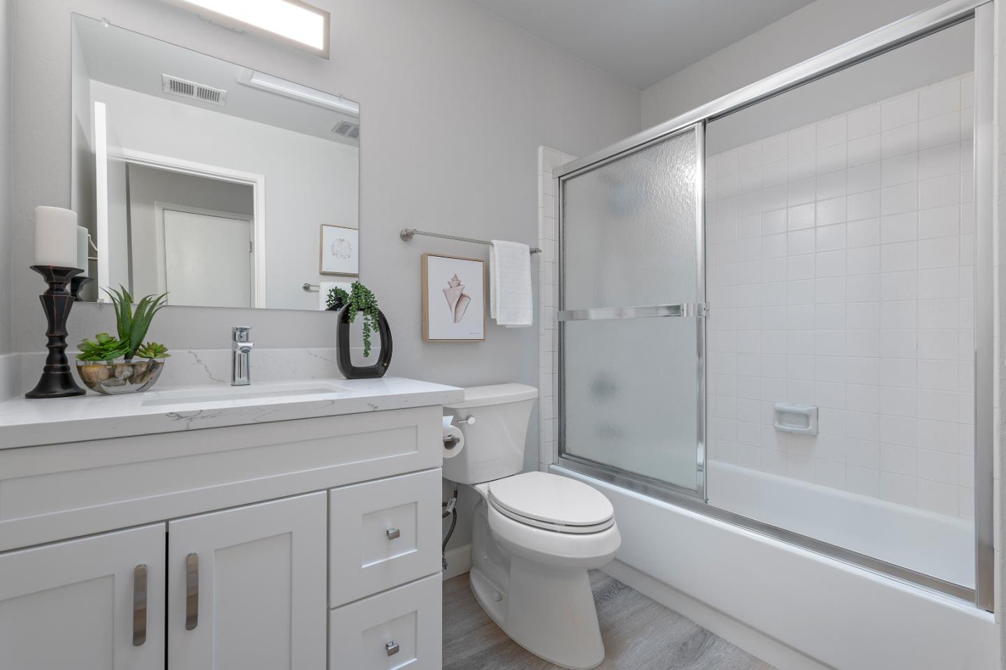 334 West Rincon Avenue Campbell, CA 95008 - Photo 20 of 25 a bathroom with a sink a toilet and shower