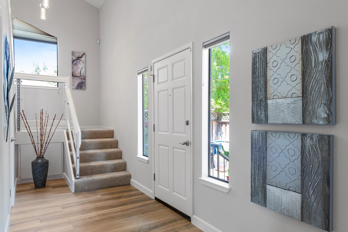 334 West Rincon Avenue Campbell, CA 95008 - Photo 4 of 25 a view of an entryway with wooden floor and door