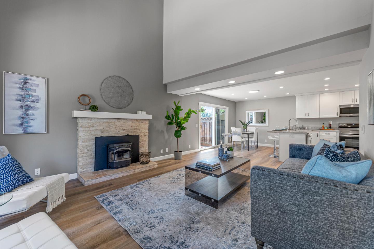 334 West Rincon Avenue Campbell, CA 95008 - Photo 5 of 25 a living room with furniture and a fireplace