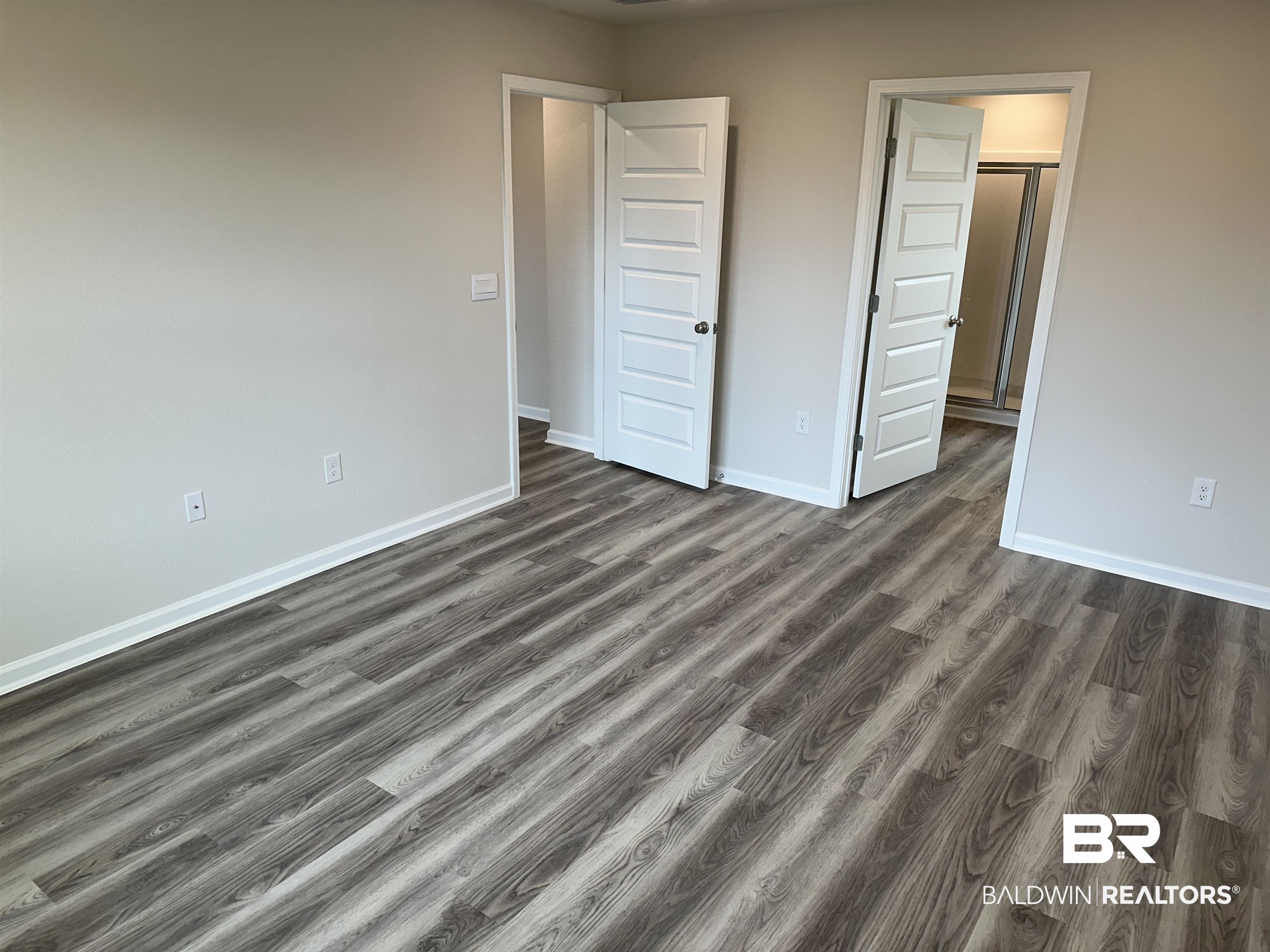 1238 Hayward Loop Foley, AL 36535 - Photo 30 of 46 Unfurnished bedroom featuring dark hardwood / wood-style floors