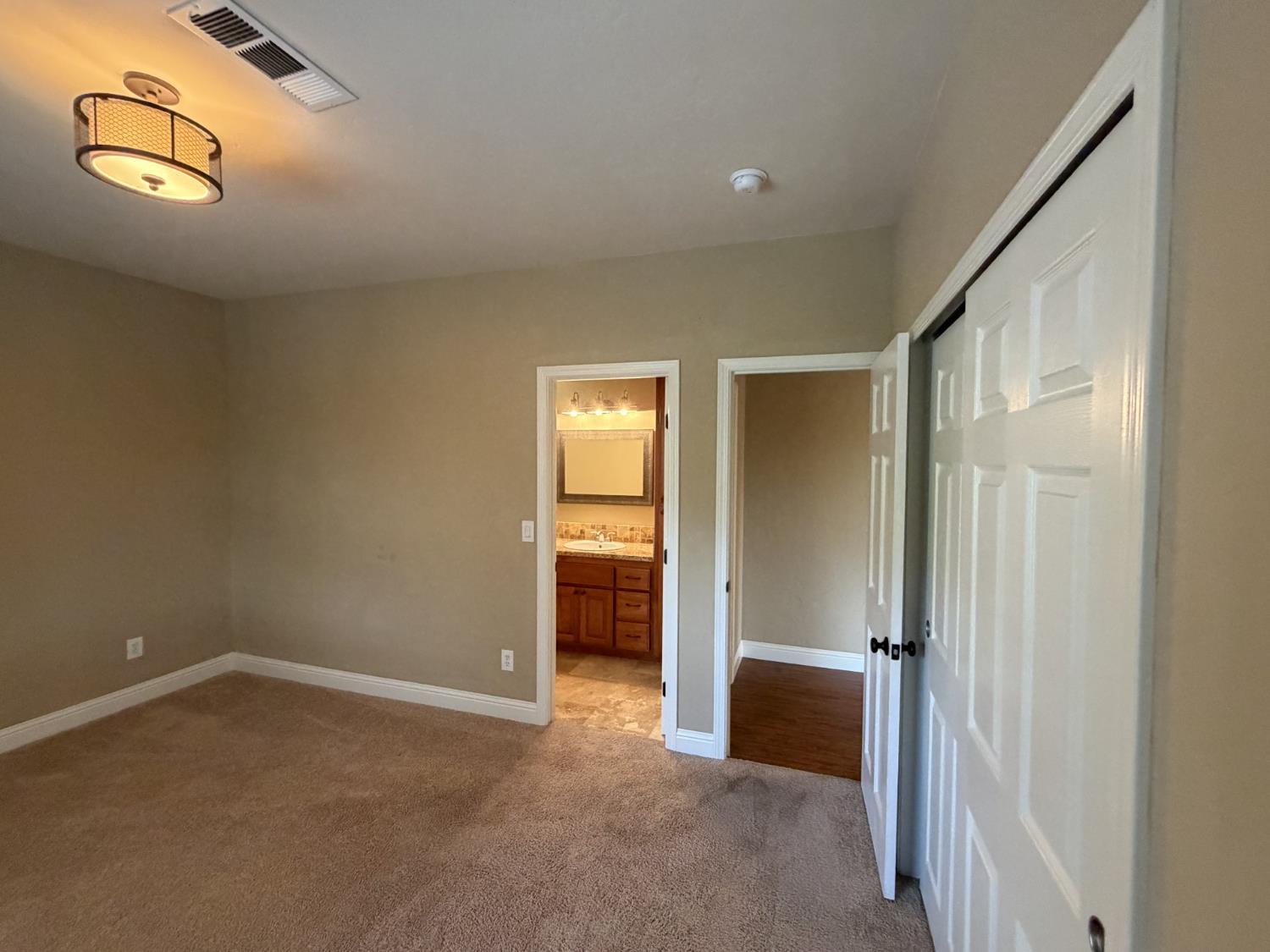 1472 Nesting Way Placerville, CA 95667 - Photo 32 of 44 lower level bedroom 4 with direct door access to full bath