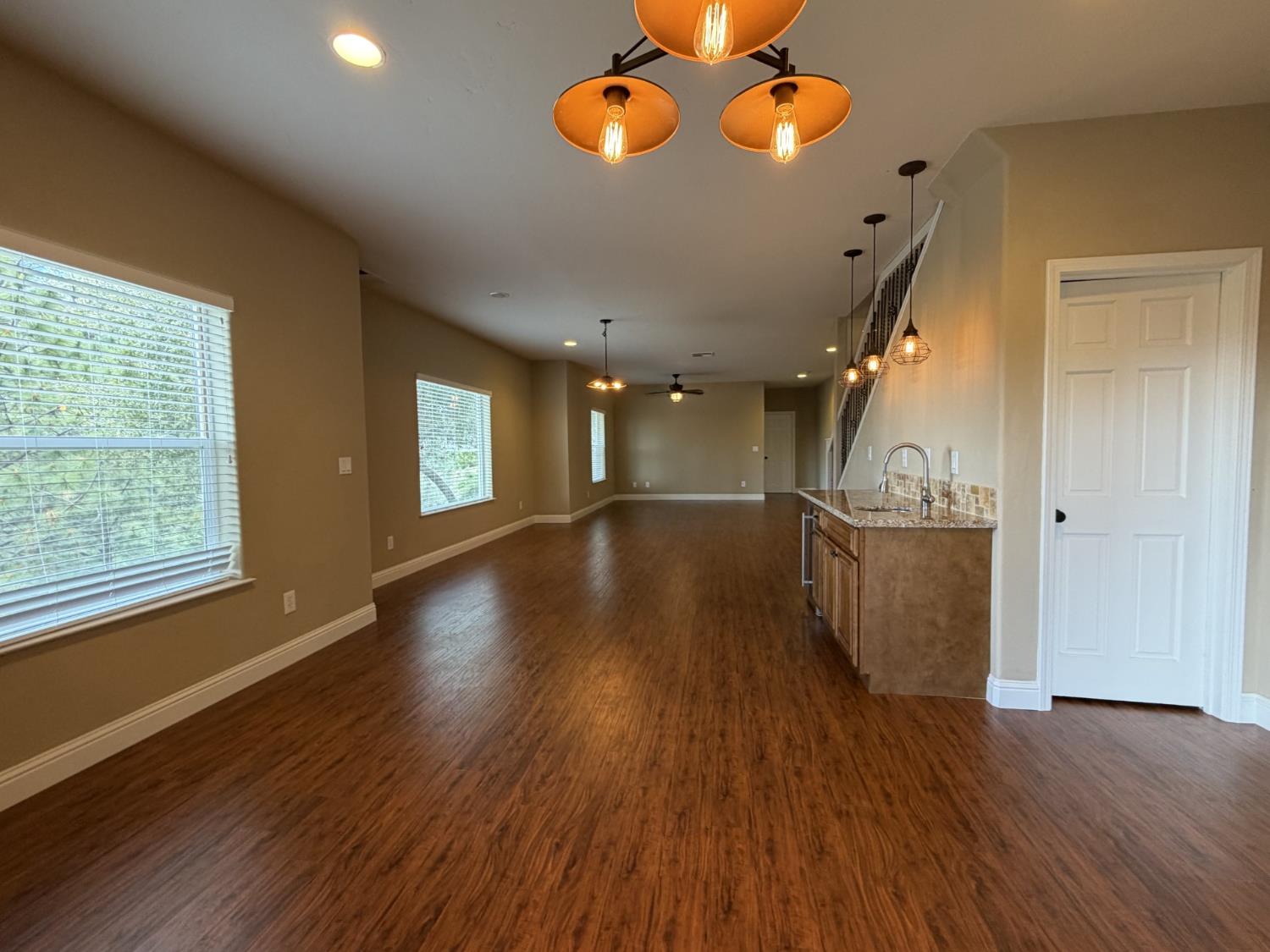 1472 Nesting Way Placerville, CA 95667 - Photo 6 of 44 lower-level, high ceiling, large family room great area with bar with sink, wine refrigerator, closet storage, bedroom and full bath and access to back yard