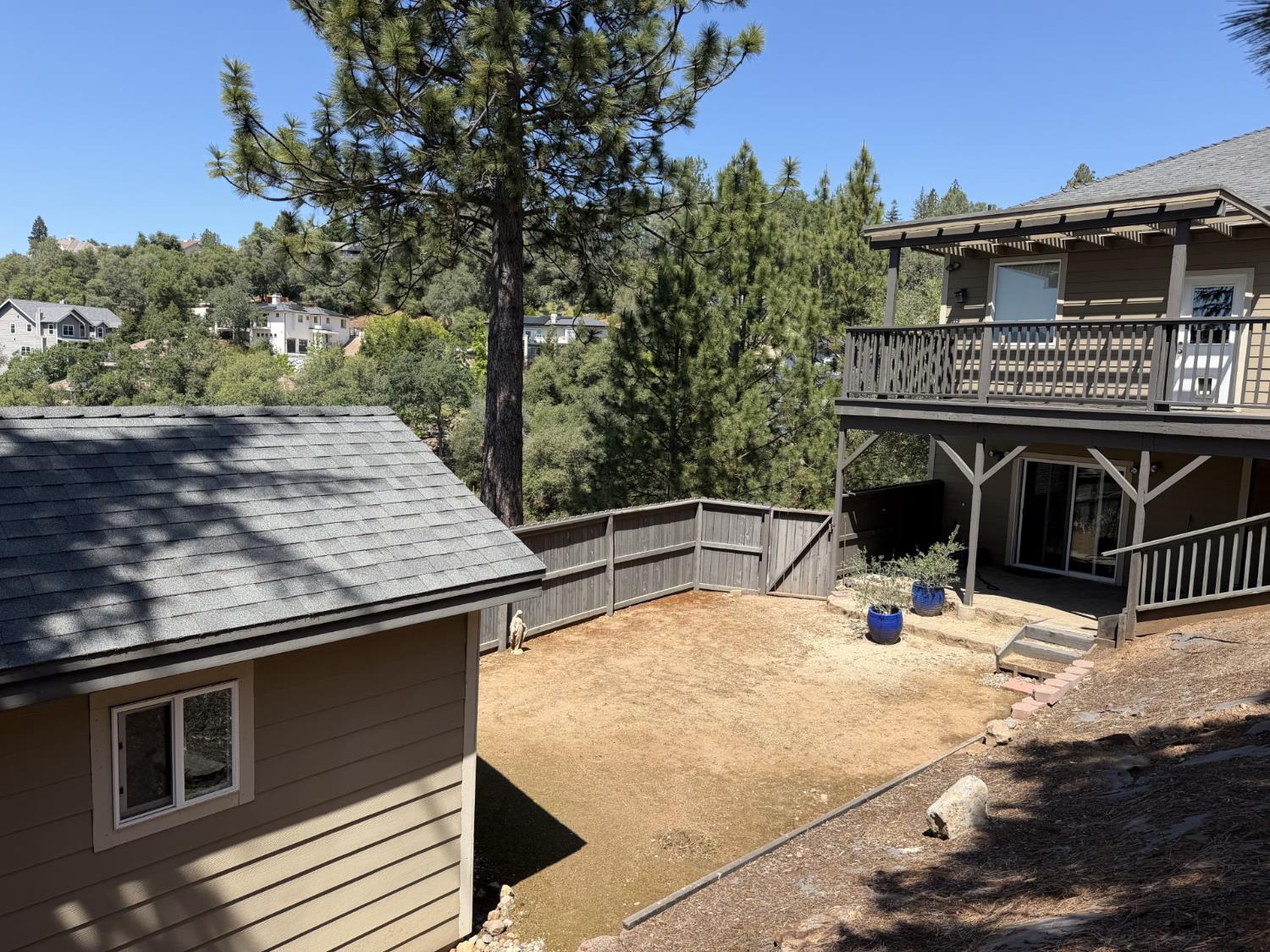 1472 Nesting Way Placerville, CA 95667 - Photo 7 of 44 back yard, deck area with large high ceiling shed