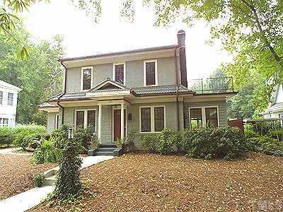 712 Nash Drive Raleigh, NC 27608 - Photo 1 of 1 a front view of a house with a garden