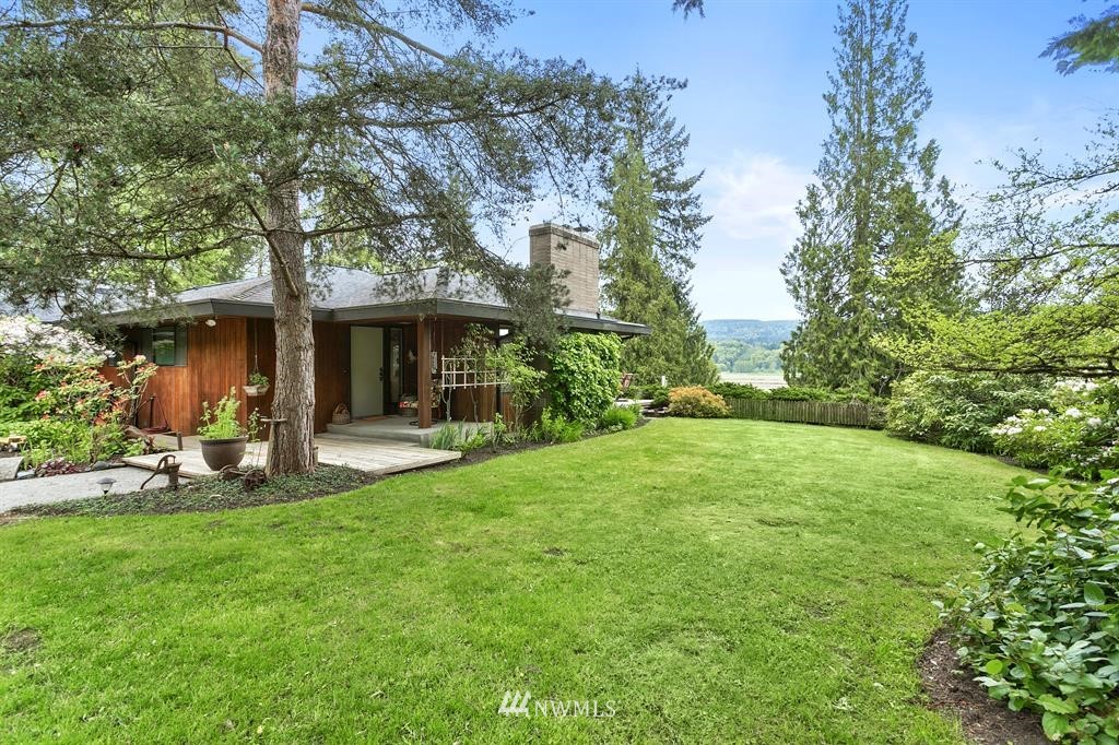 22016 High Bridge Road Monroe, WA 98272 - Photo 1 of 40 a view of a house with backyard garden and sitting area