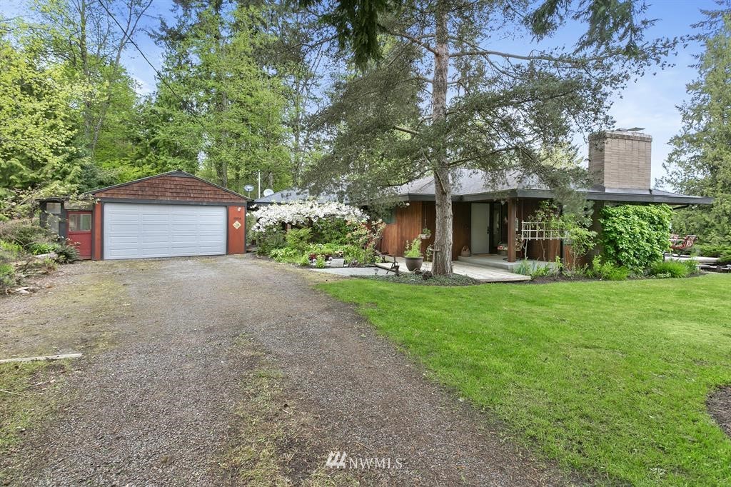 22016 High Bridge Road Monroe, WA 98272 - Photo 2 of 40 a front view of a house with garden