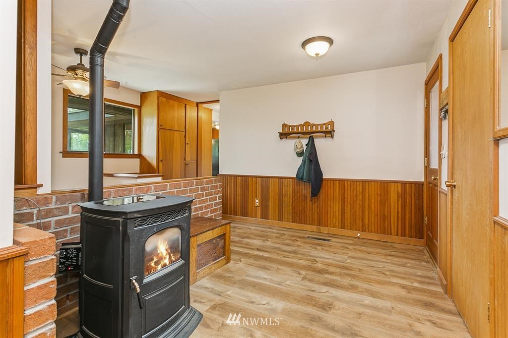 22016 High Bridge Road Monroe, WA 98272 - Photo 13 of 40 a view of a kitchen with a sink and a stove