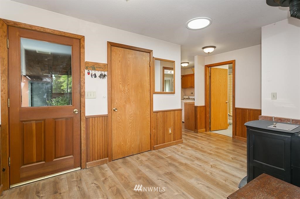 22016 High Bridge Road Monroe, WA 98272 - Photo 14 of 40 wooden floor and windows in a room