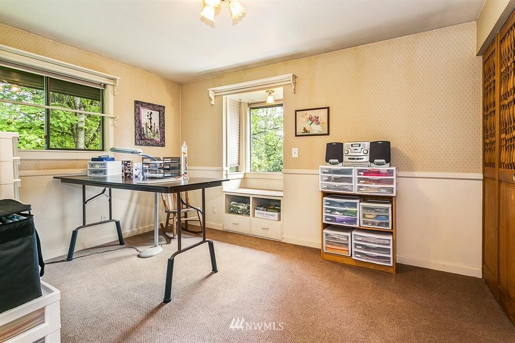 22016 High Bridge Road Monroe, WA 98272 - Photo 18 of 40 a view of a workspace with furniture and a window