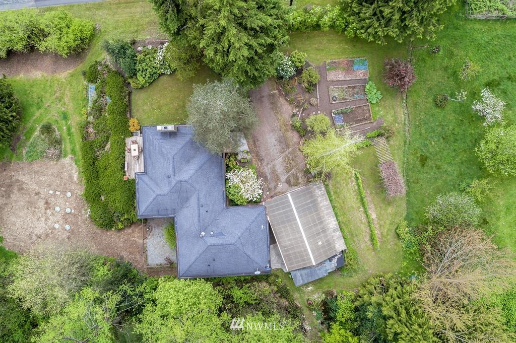 22016 High Bridge Road Monroe, WA 98272 - Photo 38 of 40 an aerial view of a house with a yard basket ball court and outdoor seating