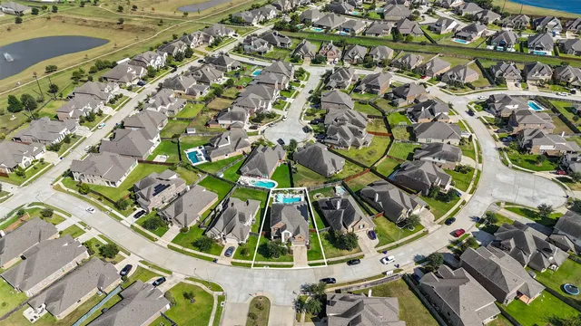 an aerial view of a swimming pool