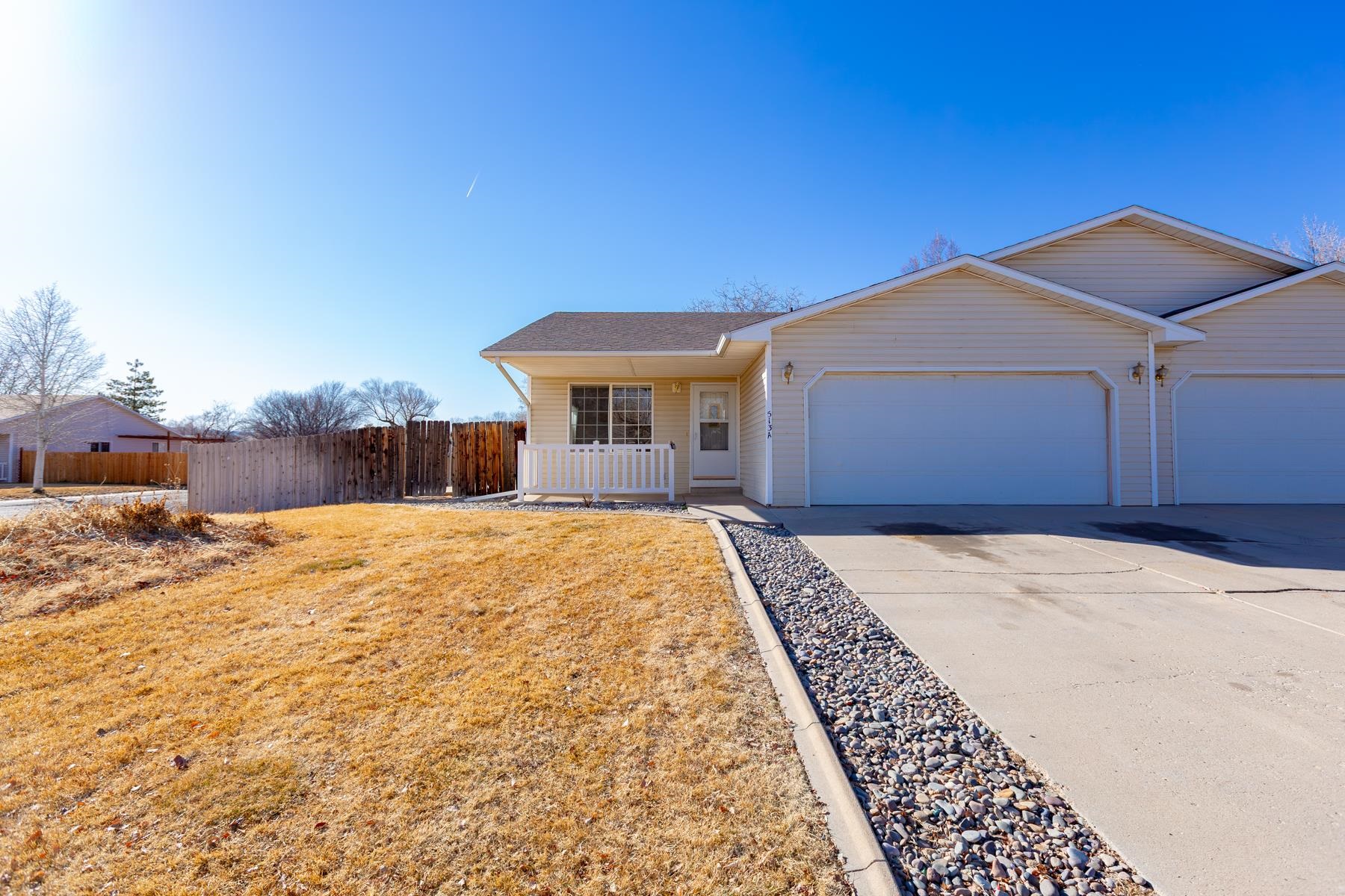 513 April Lane, Unit A Grand Junction, CO 81504 - Photo 1 of 31 a house view with a outdoor space