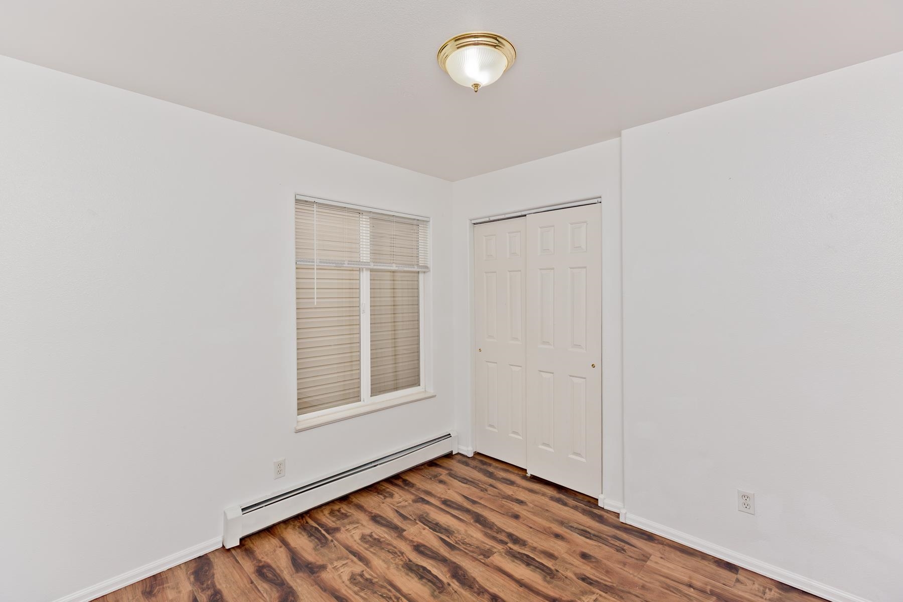 513 April Lane, Unit A Grand Junction, CO 81504 - Photo 24 of 31 an empty room with windows
