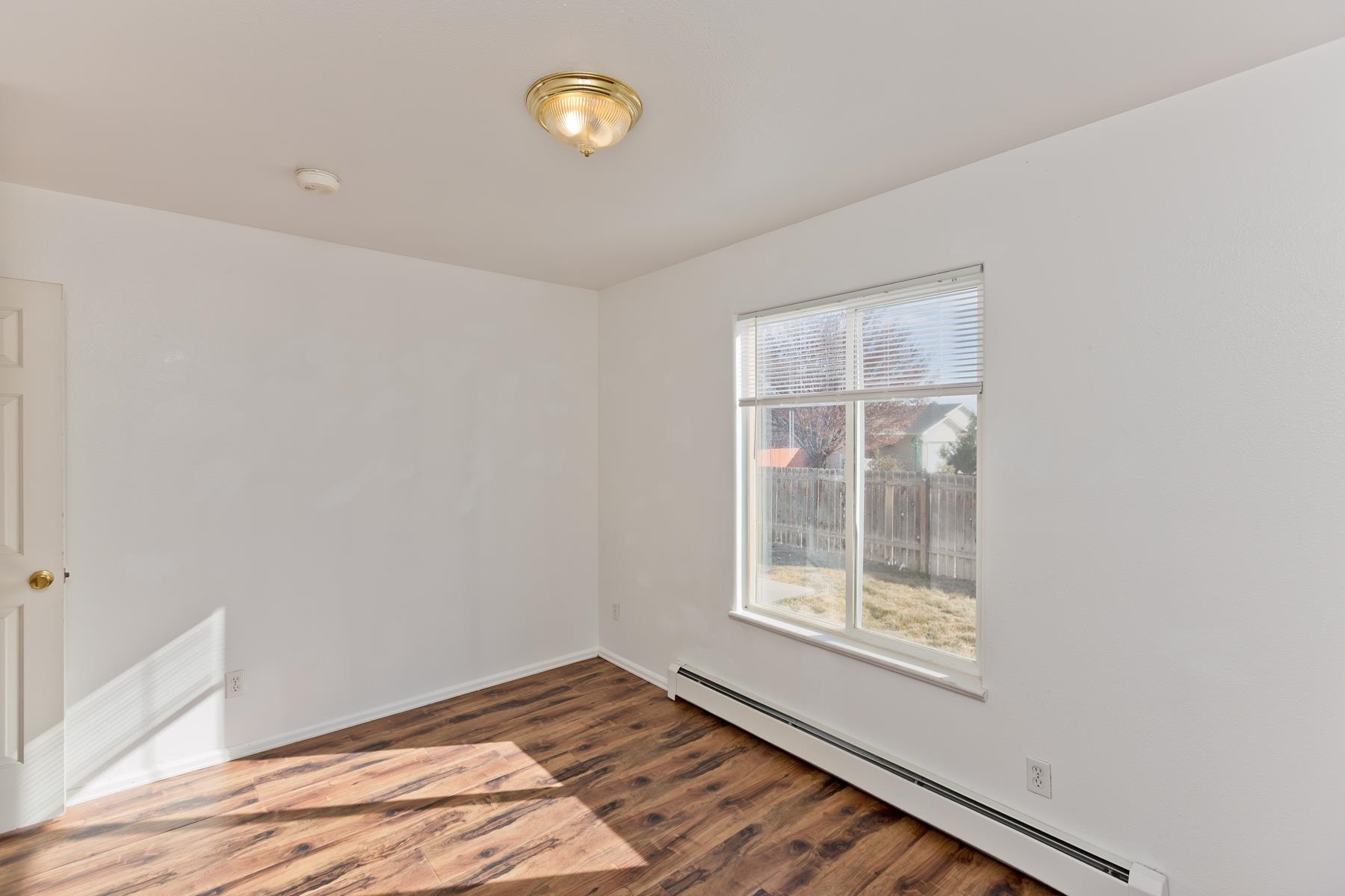 513 April Lane, Unit A Grand Junction, CO 81504 - Photo 25 of 31 a view of an empty room with a window