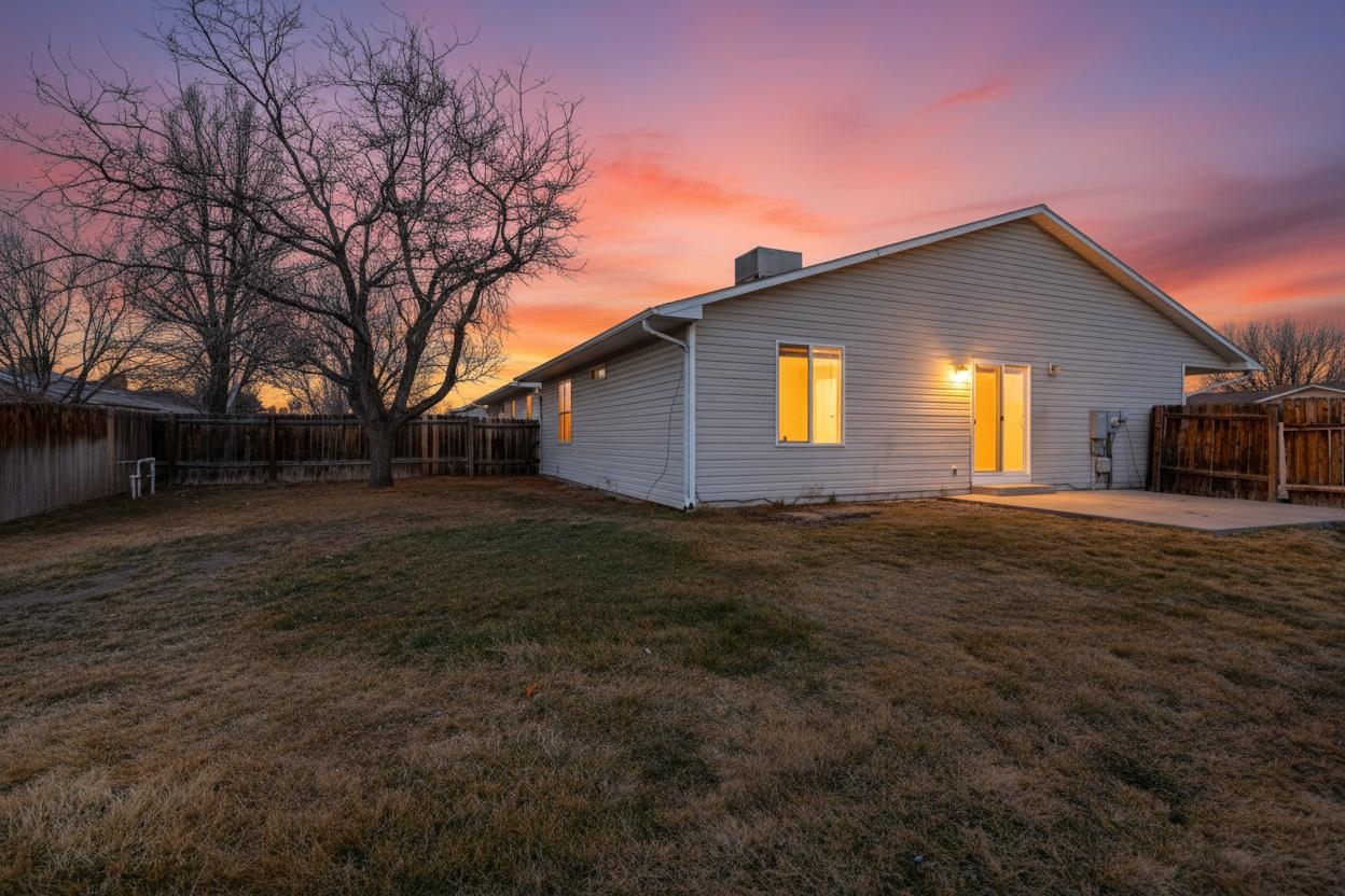 513 April Lane, Unit A Grand Junction, CO 81504 - Photo 10 of 31 a front view of house with yard