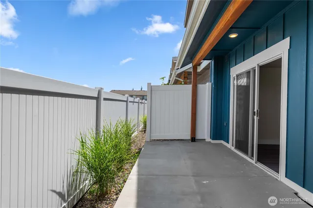 a view of a house with a flower garden
