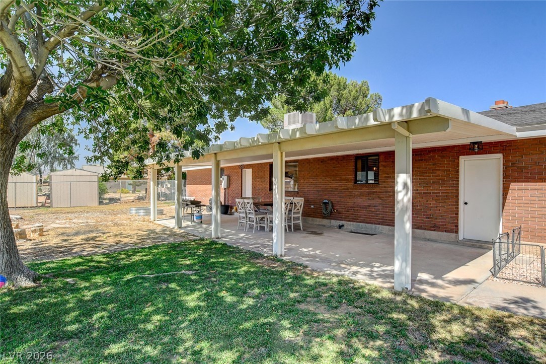 3765 Berkeley Street Logandale, NV 89021 - Photo 66 of 87 An inviting covered patio offers a comfortable outdoor space, perfect for relaxing or entertaining.