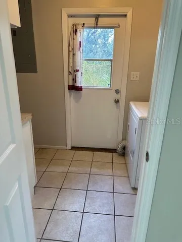 a room with wooden cabinets