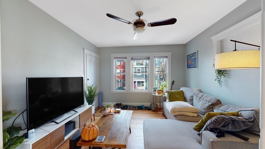 a room with furniture and a flat screen tv