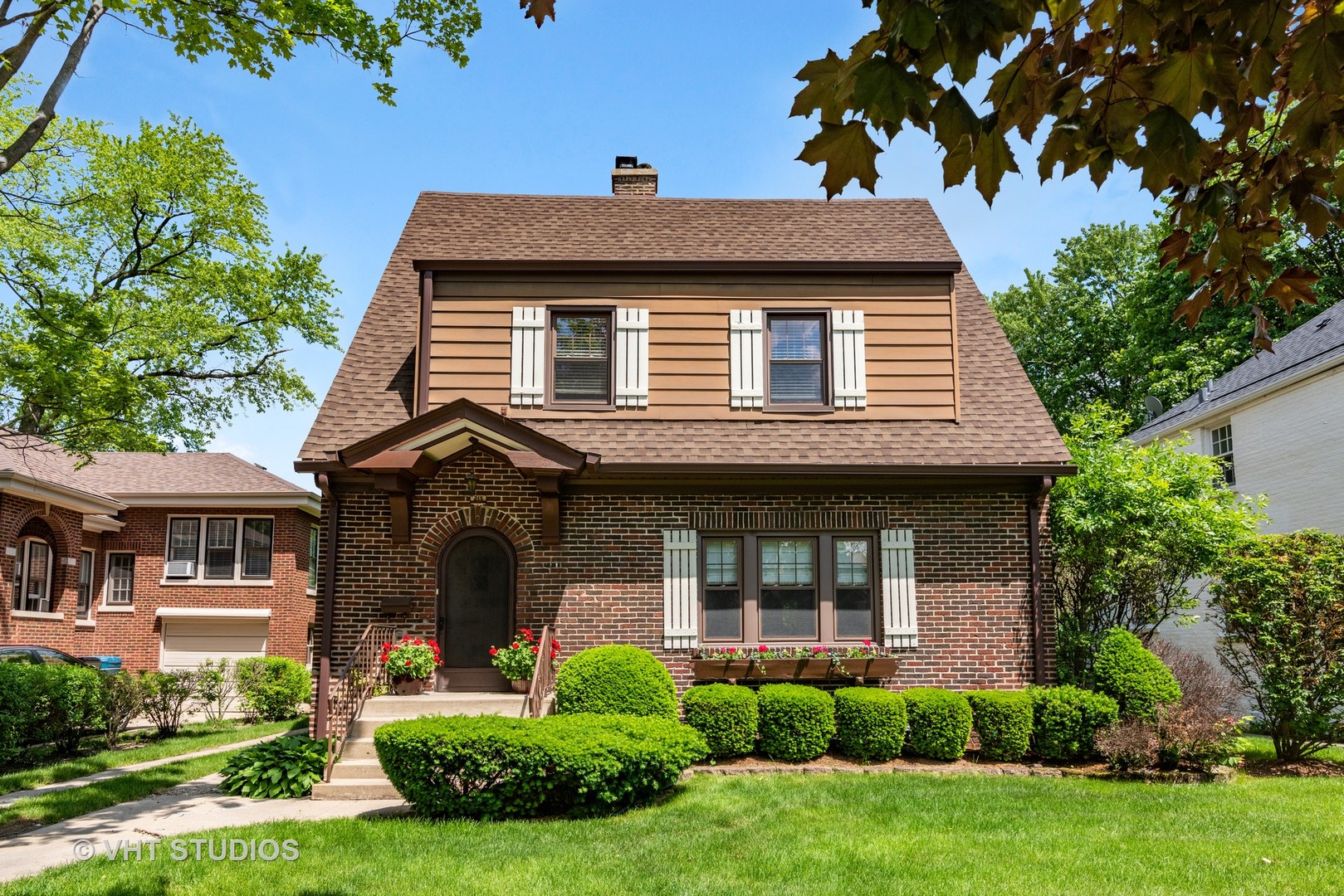 211 North Merrill Street Park Ridge, IL 60068 - Photo 1 of 26 a front view of a house with a yard