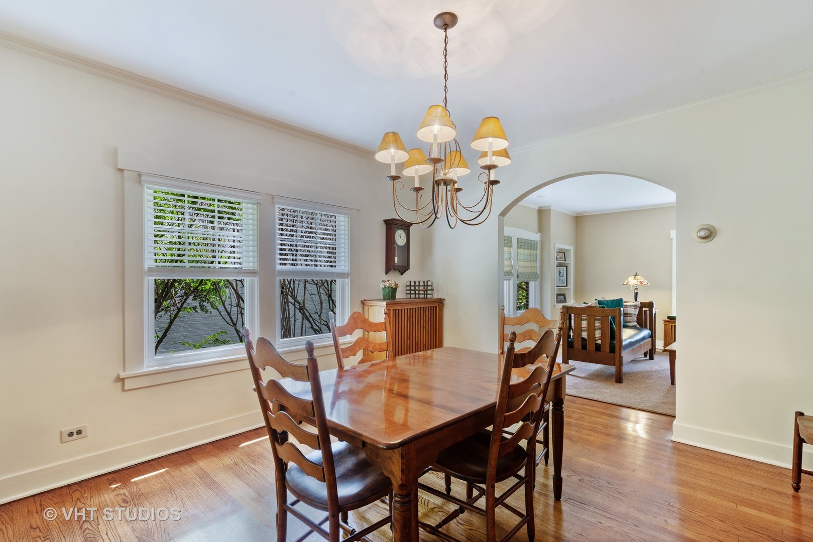 211 North Merrill Street Park Ridge, IL 60068 - Photo 11 of 26 a view of a dining room with furniture a chandelier and wooden floor