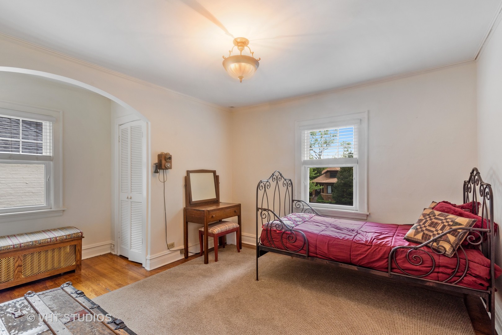 211 North Merrill Street Park Ridge, IL 60068 - Photo 19 of 26 a bedroom with a bed and a chandelier