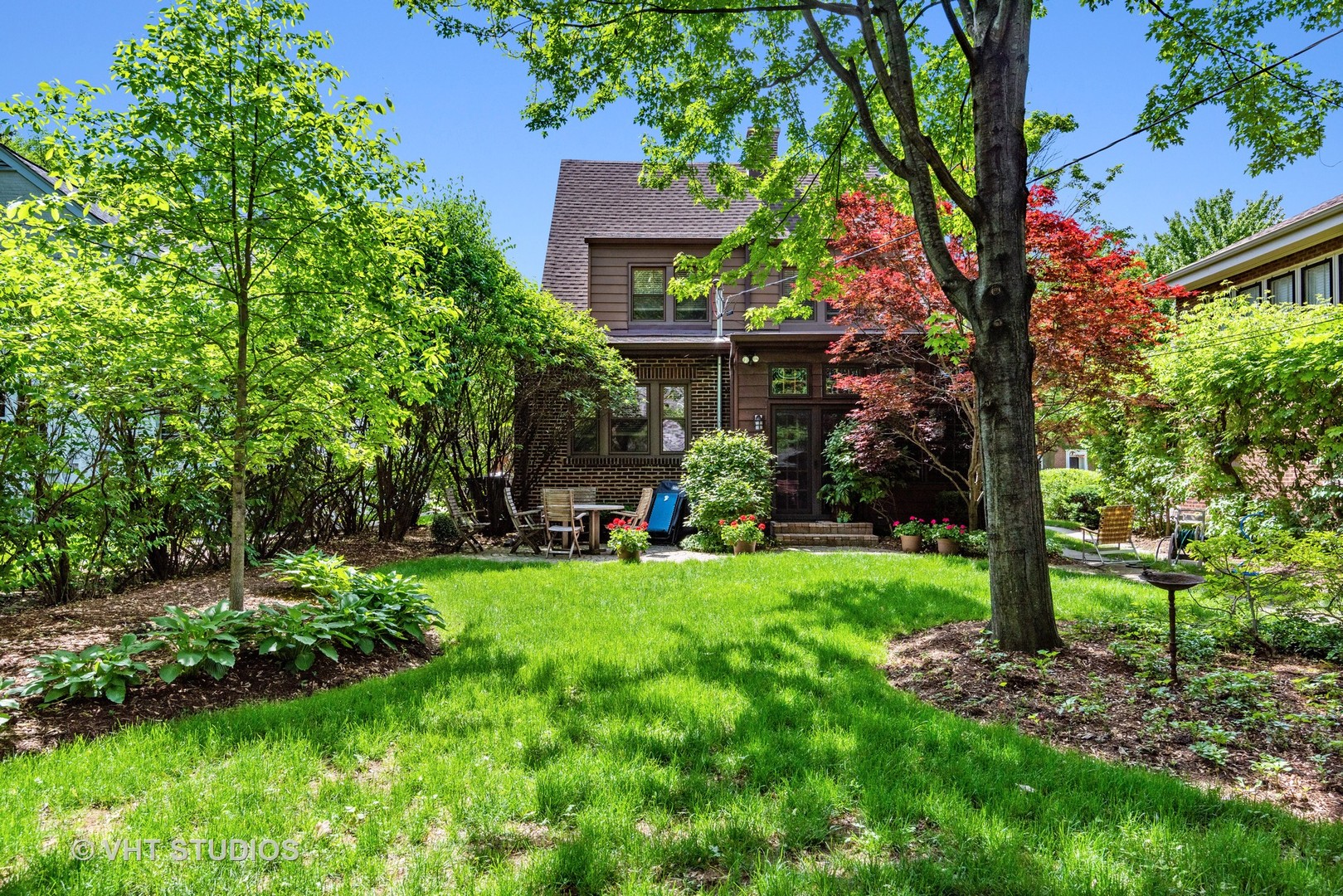 211 North Merrill Street Park Ridge, IL 60068 - Photo 22 of 26 a view of a house with a yard and sitting area