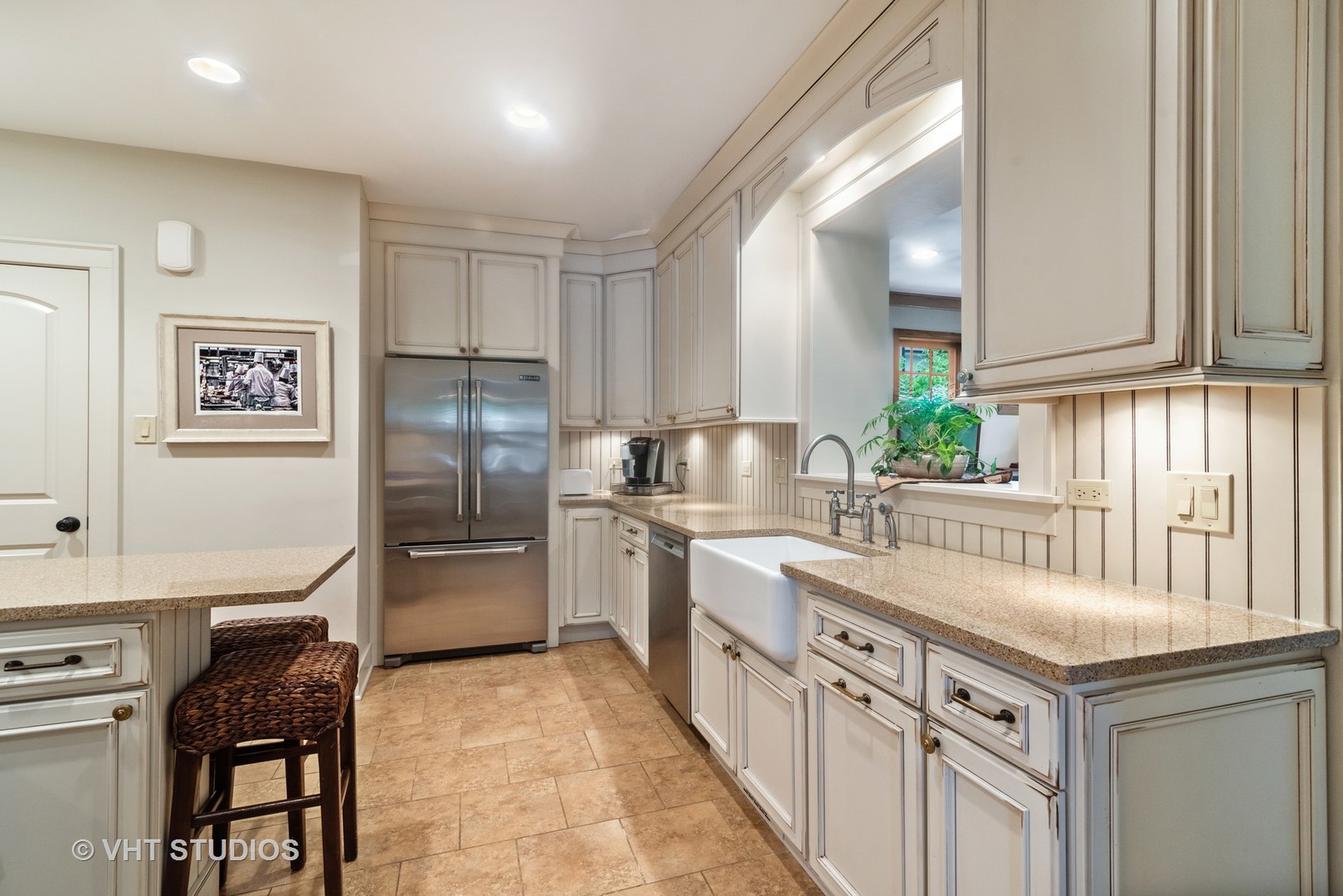 211 North Merrill Street Park Ridge, IL 60068 - Photo 5 of 26 a kitchen with granite countertop a sink appliances cabinets and furniture