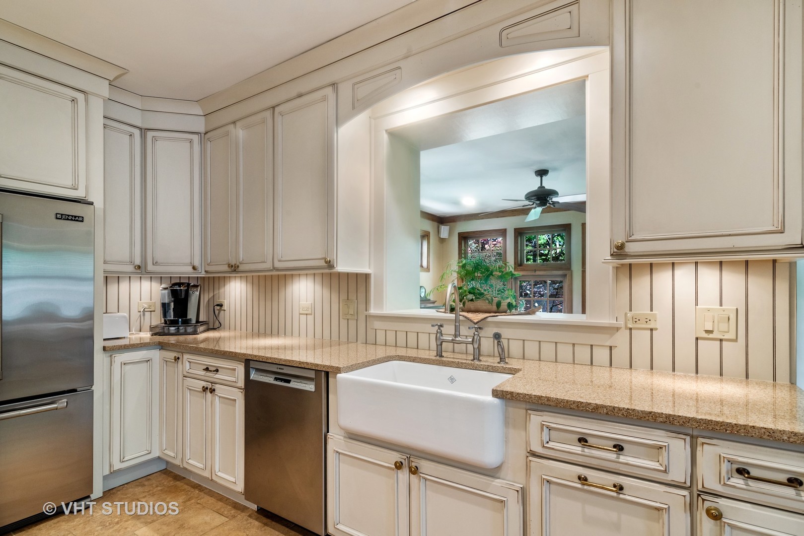 211 North Merrill Street Park Ridge, IL 60068 - Photo 8 of 26 a kitchen with cabinets appliances a sink and a window