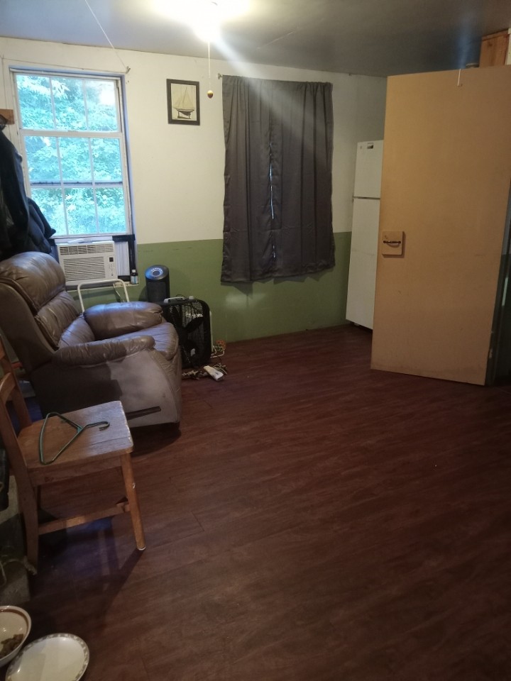 2185 Northcutts Cove Road Beersheba Springs, TN 37305 - Photo 18 of 24 a living room with furniture and a window