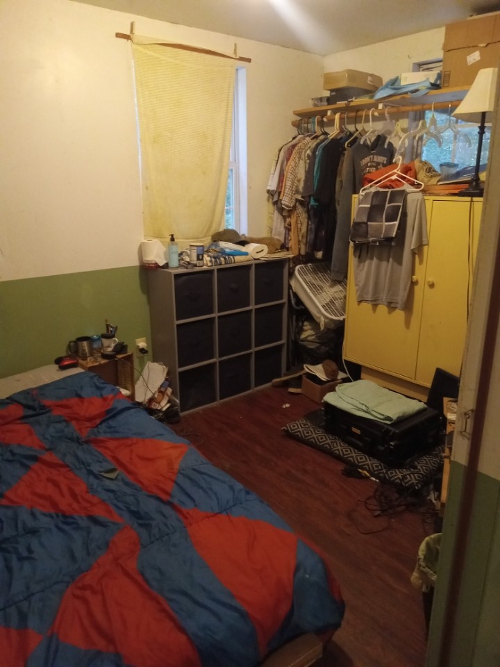 2185 Northcutts Cove Road Beersheba Springs, TN 37305 - Photo 19 of 24 a bedroom with a bed and a window