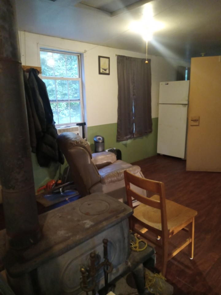 2185 Northcutts Cove Road Beersheba Springs, TN 37305 - Photo 20 of 24 a room with furniture and a window