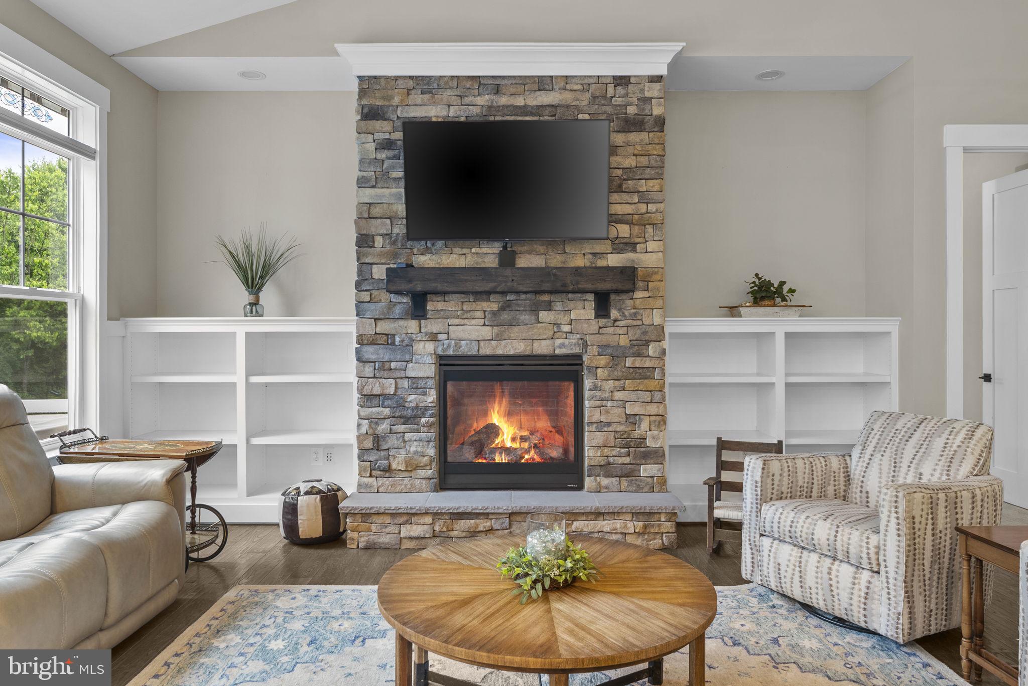 9801 Thoroughbred Road Warrenton, VA 20187 - Photo 50 of 119 Fireplace with Built-in bookshelves