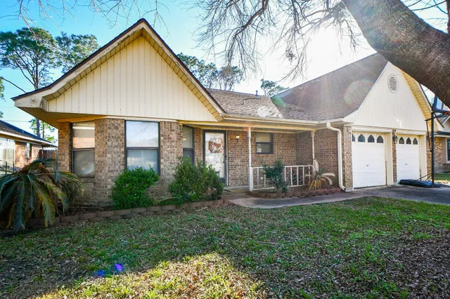 a bed room with a bed and a window