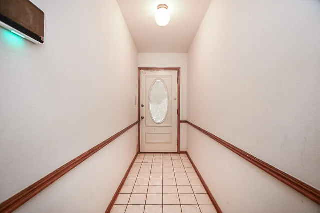 a bathroom with a shower and a bath tub
