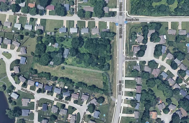 a view of a balcony with a potted plants
