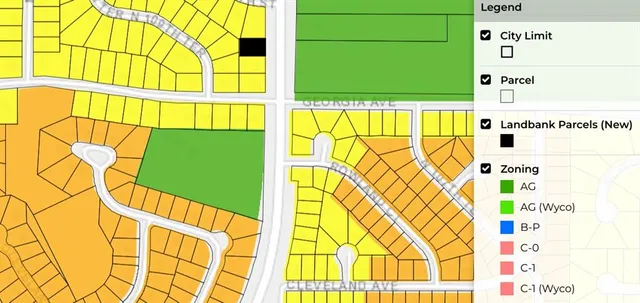 a view of a swimming pool with a yard