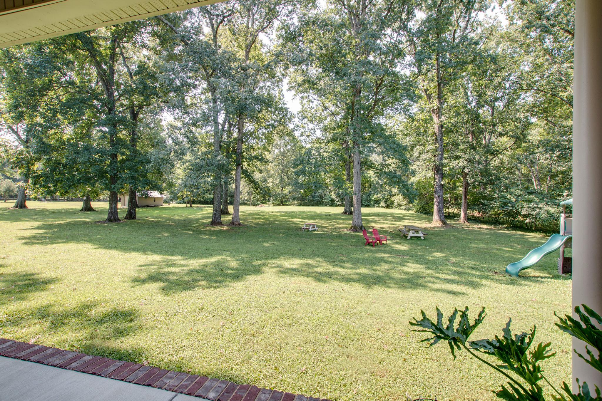 6629 Burnt Knob Road Murfreesboro, TN 37128 - Photo 15 of 27 View of yard from back. These trees are AWESOME!