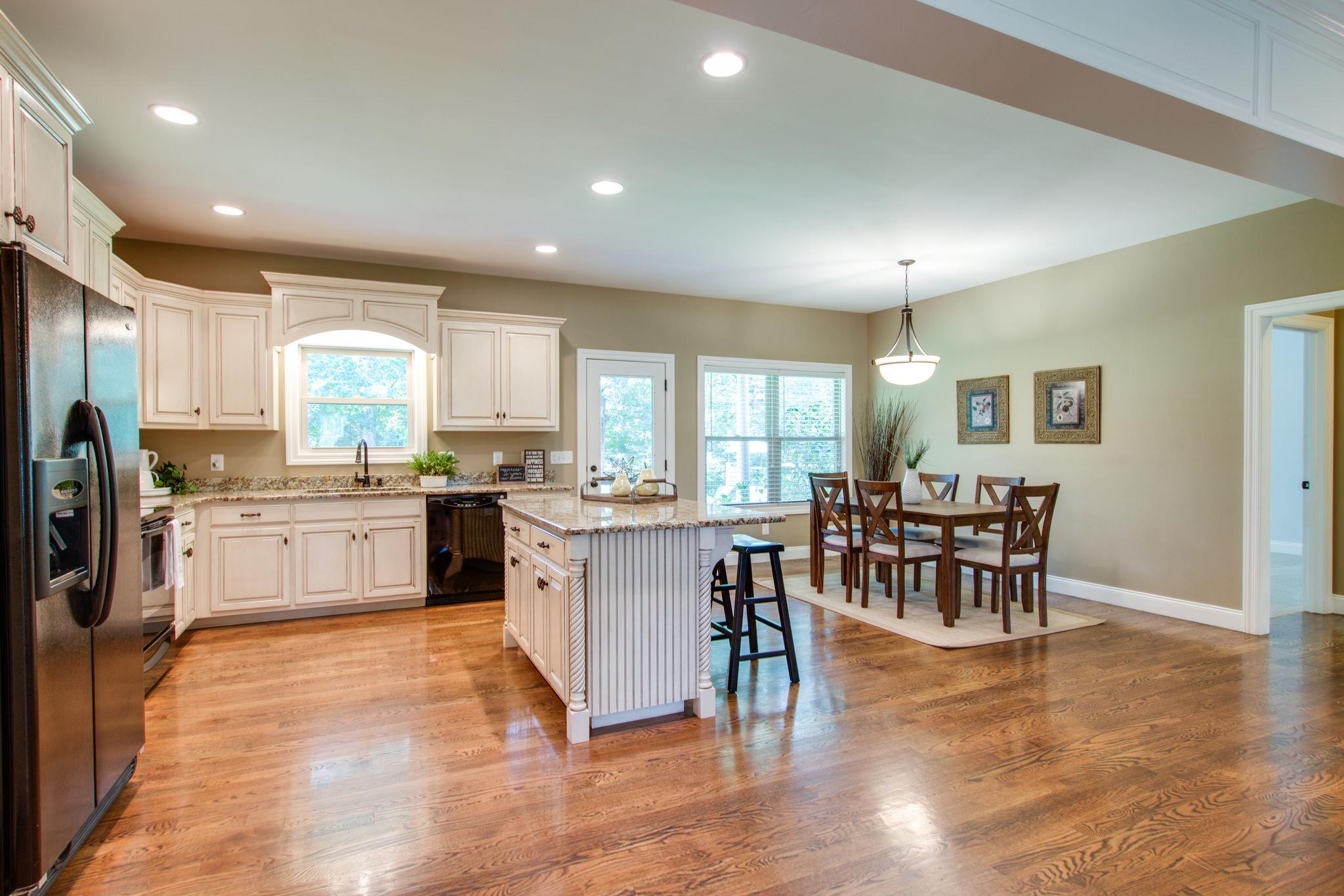 6629 Burnt Knob Road Murfreesboro, TN 37128 - Photo 3 of 27 The kitchen island with a granite overhang for stools makes a good place to do homework and visit with Mom:)