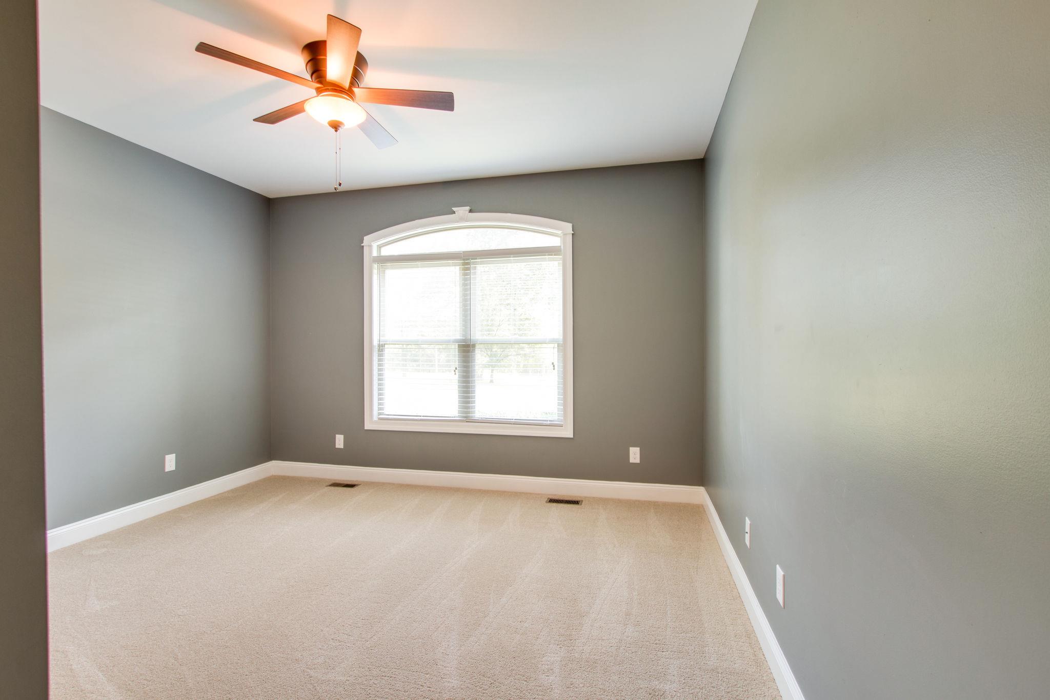 6629 Burnt Knob Road Murfreesboro, TN 37128 - Photo 24 of 27 Another secondary bedroom on the main level. Good size with enhanced closet.